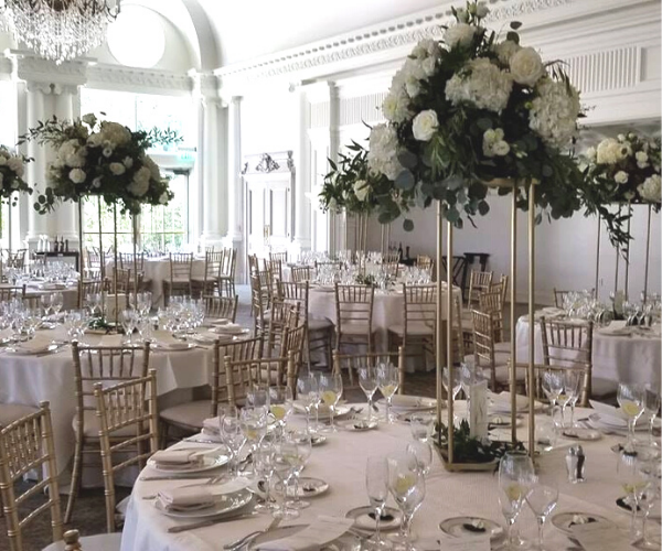 table with white cloth linens